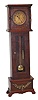 Westclox Baby Ben alarm clock in a tall miniature grandfather clock case.