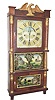 A three decker clock with label "Eight Day/BRASS/CLOCKS/MANUFACTURED BY /R. and J.B. TERRY/Bristol, Conn." ca 1835-1836.