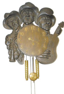Waterbury Clock Co. rare and unusual carved wall clock called, "The Music Men", C. around 1920. — Antique Clocks Price Guide