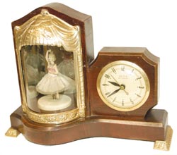United Self Starting, "Ballerina" model, animation, music, and time, C. 1955. — Antique Clocks Price Guide