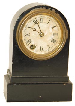 Terry Clock Co. in a 9" iron case, almost identical to #4. — Antique Clocks Price Guide