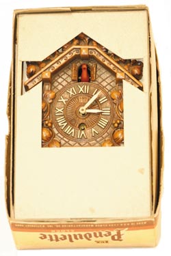 Lux Pendulette in the original advertising box and display setup enclosed. — Antique Clocks Price Guide