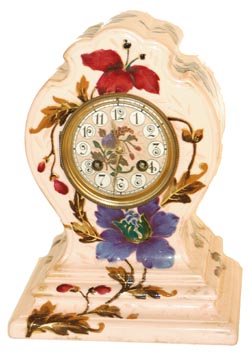 French porcelain clock, "Longwy" stamped into the pink case. — Antique Clocks Price Guide