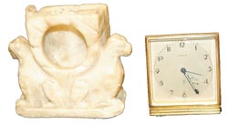 This is a pair of items with no similarity. The soapstone watch holder is a leftover from a prior auction where I had it numbered wrong therefore got no bids. — Antique Clocks Price Guide