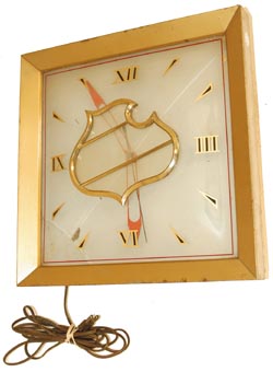 Falstaff Beer electric clock in a heavy metal case that sits or hangs. — Antique Clocks Price Guide