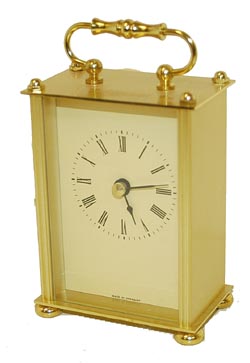 "Made in Germany", quartz clock to look like the little carriage clocks. — Antique Clocks Price Guide