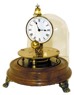 A Horolovar reproduction of the Briggs Rotary Pendulum Clock. — Antique Clocks Price Guide