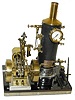 Working steam engine made primarily of brass and steel.