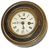 S. B. Jerome, 6.5" round gallery, very similar to #319, but round leatherette case, no buttons, no fancy brass trim around the edge, just a brass band similar to the bezel.