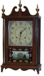 Seth Thomas "Tradition", ca. 1941. 20 inches high mahogany case, turned fluted columns, solid brushed finials, dial, lower glass excellent. — Antique Clocks Price Guide