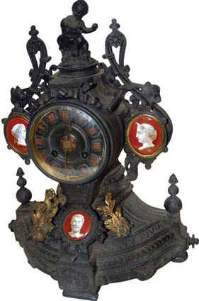 French metal clock, statue of boy and dog on top and portraits of 3 famous people. — Antique Clocks Price Guide