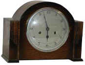 English oak mantle, 8 day, striking a standing gong. — Antique Clocks Price Guide