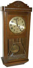 German box clock, 8 day movement is unsigned, strikes Bim-Bam, 4 hammers on 4 rods, half hour and hours. — Antique Clocks Price Guide