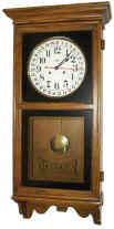 Howard Miller calendar store regulator. — Antique Clocks Price Guide
