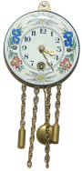 German type cuckoo, porcelain face, plastic can. — Antique Clocks Price Guide