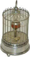 Bird In Cage. Complete, original, running. — Antique Clocks Price Guide