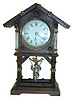 Junghans Shelf clock, circa.1880-1900's. 12 inch high mini oak case, open well bottom.