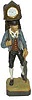 Cuckoo clock salesman, molded of some hard material, pieces glued together, painted.
