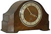 "Made in England by the Enfield Clock Co.".