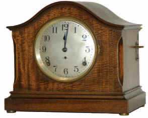"No. 55", ca 1915. 4 bell Sonora Chimes in one of their smallest cases, only 10.5 inches wide and 9.5 inches high. — Antique Clocks Price Guide