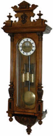 Vienna Regulator, 3 weights, strikes one quarter hour and hours, each quarter. Top and finials may not be original to this clock, always a puzzle but if in doubt we call them replaced. — Antique Clocks Price Guide