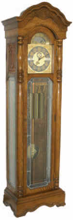 Colonial Tall Clock with a cable weight driven movement, 8 day, triple chime. It plays Westminster, Whittington, and Winchester chimes. — Antique Clocks Price Guide