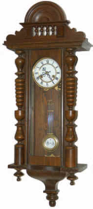 German RA, typical walnut case with headpiece, tapered tail, finials, 3 glasses, half columns, etc. — Antique Clocks Price Guide