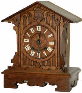 Shelf cuckoo with some restoration. The case is clean, no evidence of missing parts or broken pieces. — Antique Clocks Price Guide
