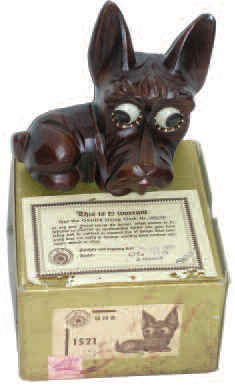 Oswald novelty clock, ca 1960. This guy has a 6 inches high composition case and is a Scotty dog. — Antique Clocks Price Guide