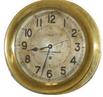 Chelsea Clock Co., Boston n U.S. Maritime Commission, Serial No. 9388, signed on the silver dial of this brass cased clock. — Antique Clocks Price Guide