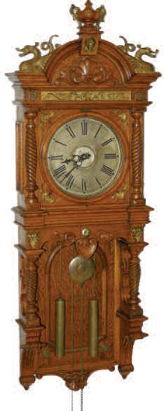 Waterbury Clock Company's hanging "Augusta", ca 1893. A very heavy oak case with a cabinet finish, glass sides and gilt ornaments. — Antique Clocks Price Guide