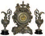 Ansonia Clock Company, metal case n mantle clock, "Lydia with Louis XVI Pitchers", ca 1894 and 1904. The set was cleaned and polished by Bruce Baziluk. — Antique Clocks Price Guide