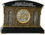 Ansonia Clock Company "Georgia", ca 1892. Enameled iron and spelter mantle clock refinished to the original colors by Bruce Baziluk, who specializes in restoring metal clocks. — Antique Clocks Price Guide