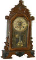 E. Ingraham and Co. walnut parlor clock, 8 day, hourly bell strike, alarms on the same bell. — Antique Clocks Price Guide