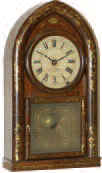 Beehive clock, "Patent Spring Eight-Day Brass Clocks, Springs Warranted Not to Fail, Made And Sold by Brewster and Ingrahams, Bristol, Conn." from the full case label. — Antique Clocks Price Guide