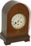 Junghans 8 day Westminster chime movement in a arch top case. — Antique Clocks Price Guide