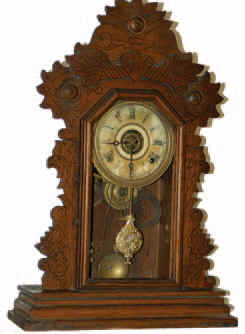 E. Ingraham walnut parlor clock, "Press", ca 1891. — Antique Clocks Price Guide