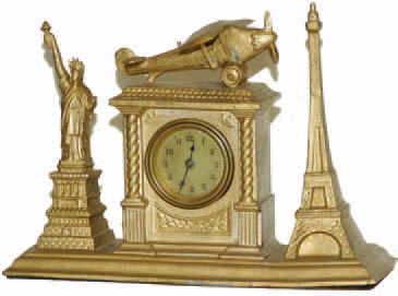Lux Clock Co. Commerative clock that is probably called "The Spirit of St. Louis", or something similar. — Antique Clocks Price Guide