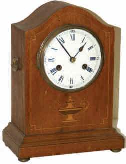 Haas and Soehne (Sons), German shelf clock, ca 1910. Good little 13 inches light mahogany case with inlay designs on the front. — Antique Clocks Price Guide