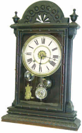 Waterbury Clock Co., shelf "Albany", ca 1891. 24 inches high walnut case, original finish. — Antique Clocks Price Guide