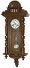 German RA, typical walnut case with headpiece, tapered tail, finials, 3 glasses, half columns, etc.