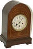 Junghans 8 day Westminster chime movement in a arch top case.