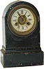 The Terry Clock Co. Waterbury, Conn. black iron clock, 8 inches tall.