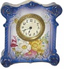 German miniature porcelain clock, 6 inches tall.