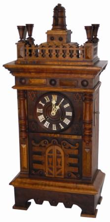A castle style shelf Trumpeter, ca about 1850. It is a two horn trumpeter in good working condition. — Antique Clocks Price Guide