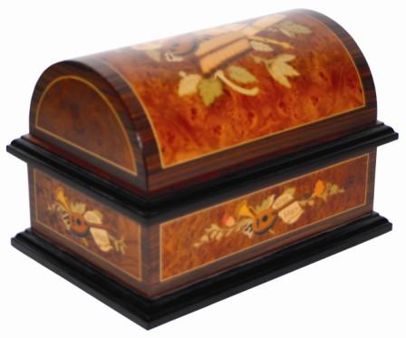 Reuge Music / Sainte-Croix Switzerland / Disc Music Box / A Century Old Tradition, copied from the label underneath. Box with a hinged coffin top and elaborate inlay on all sides. — Antique Clocks Price Guide