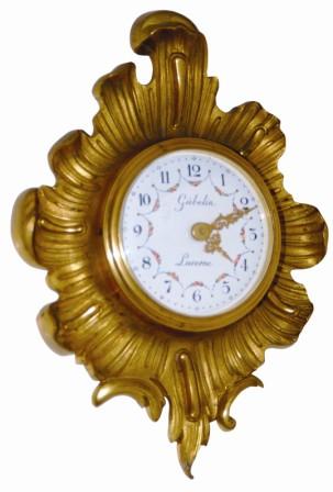 Miniature bronze cartel clock. Swiss 8 day time only movement is watch size, back wind and set and running perfectly. — Antique Clocks Price Guide