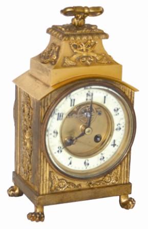 French desk, or small mantle clock, with a rare escapement on the dial. In the place where you would normally see a Brocot Escapement there is a Lever escapement, and in front of it is a slow/fast adjusting hand. — Antique Clocks Price Guide