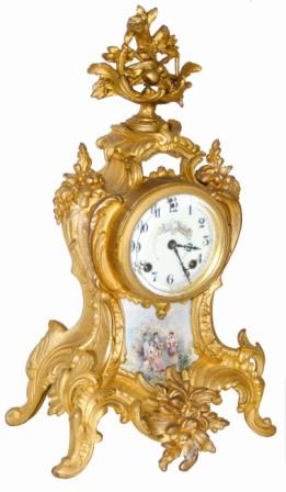 New Haven Clock Co. metal case clock finished in ormolu gold plate and retaining most of the gold. — Antique Clocks Price Guide
