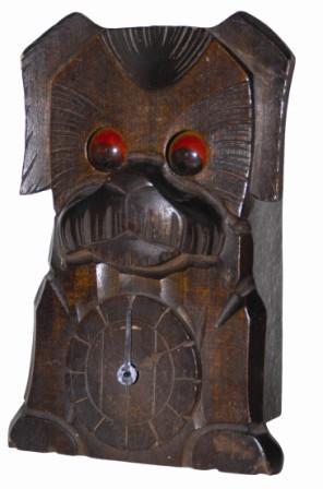 Blinking Eye carved wood dog, an early model ca 1930. Excellent case is 7.5" high, darkened over time, complete, and all original. — Antique Clocks Price Guide